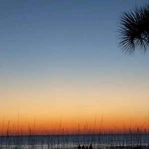 North America, USA, Florida, Sarasota, Orange and blue Sunset on the Crescent Beach