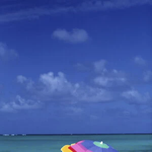 North America, USA, Hawaii. Beach scene, with umbrellas and beach toys