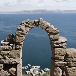 South America - Peru. Stone archway and path to the dock at Taquile Island on Lake Titicaca