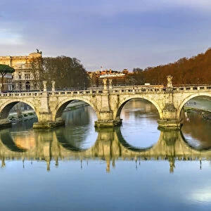 St. Angelo Bridge, Tiber River reflection, Rome, Italy. Bridge first built by Emperor
