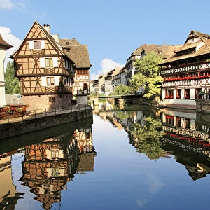 Timbered buildings, La Petite France Canal, Strasbourg, Alsace, France, Europe
