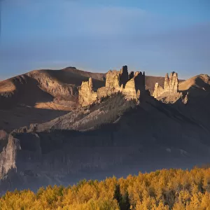 USA, Colorado, Gunnison National Forest. The Castles rock formation on an autumn sunrise