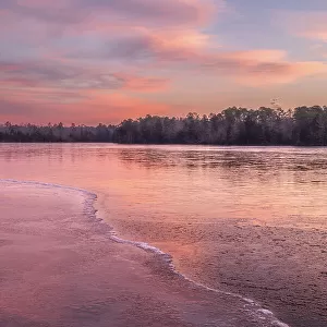 USA, New Jersey, Pine Barrens National Preserve. Sunrise on lake