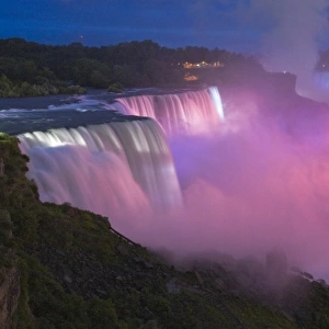 USA, New York, Niagara Falls. Close-up view at twilight of the waterfalls and mist