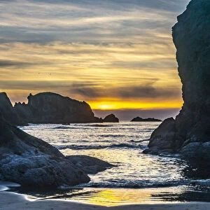 USA, Oregon, Bandon Beach. Pacific Ocean sea stacks at sunset