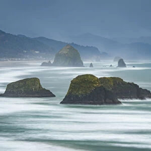 USA, Oregon, Cannon Beach. Long exposure of beach and sea stacks