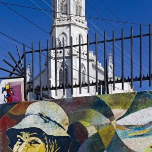 ValparaIso, Chile. South America. Portion of Mural and church of SeOora del Carmen