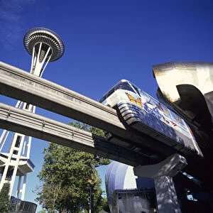WA, Seattle, Monorail with the Experience Music Project and Space Needle
