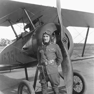 American Ace pilot. Wilson with his plane during World War I