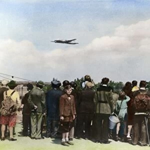 BERLIN AIRLIFT, 1948. Berliners watching the arrival and departure of Allied airlift