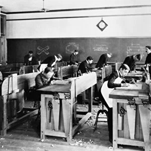 CARPENTRY CLASS, 1899. Carpentry class in the manual training room at a high school in Holyoke