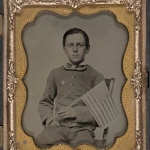 CIVIL WAR: BOY, c1863. Portrait of a boy holding a 34-star flag. Ambrotype, c1863
