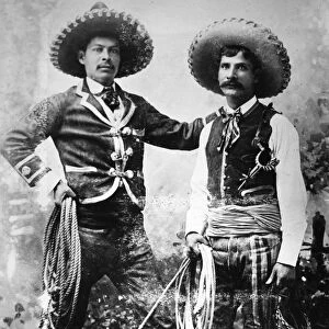 COWBOYS, c1900. Mexican cowboys in one of Buffalo Bills Wild West Shows, c1900