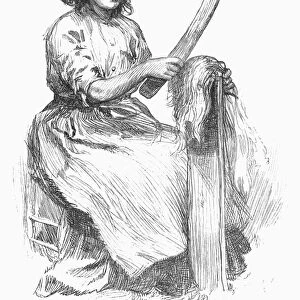 DRESSING FLAX, 1883. Canadian woman dressing flax for textile fiber. Engraving, 1883