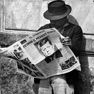 An Ecuadoran man reads about the assassination of John F. Kennedy in El Comercio newspaper, 23 November 1963