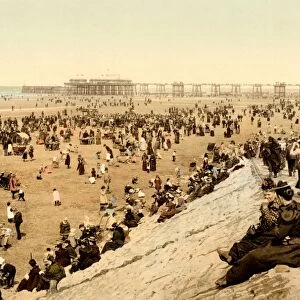 ENGLAND: BLACKPOOL, c1900. A view of the beach at Blackpool, on the Irish Sea in Lancashire, England, with the North Pier seen in the distance. Photochrome, c1900