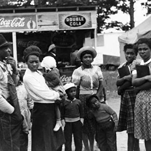 GEORGIA: COUNTRY FAIR, 1941. An African American farm family at the Greene County Fair