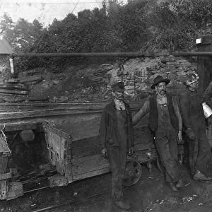 HINE: COAL MINERS, 1908. A group of miners, drivers and trappers at a coal mine in Macdonald