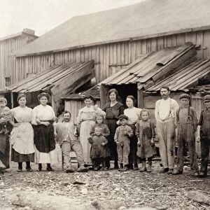 HINE: HOUSING, 1911. Fifty oyster shuckers housed in this miserable row of dilapidated shacks