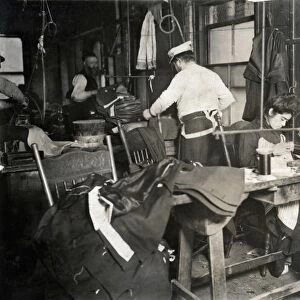 HINE: SWEATSHOP LABOR, 1908. Women sewing garments in a sweatshop in New York City