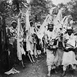 HUPA DANCE, 1897. Two Hupa chiefs carrying sacred obsidian knives in front of a