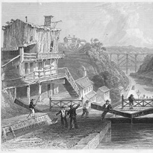 LOCKPORT, NEW YORK, 1838. A lock on the Erie Canal at Lockport, New York. Steel engraving, 1838, after a drawing by William Henry Bartlett (1809-1854)