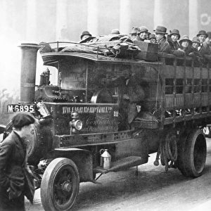 London office workers riding to work on a lorry pressed into bus service during the general strike of May 3-12, 1926