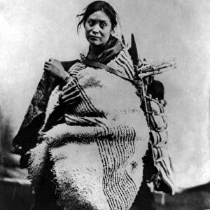 NAVAJO WOMAN & CHILD, c1866. A Navajo woman with an infant on her back. Photograph by John Gaw Meem, c1866