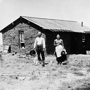 NEBRASKA: SETTLERS, 1886. Homesteader Reverend Todd and family in front of their