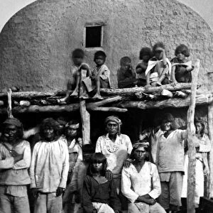 NEW MEXICO: ZUNIS, 1873. Group of young Zuni men and boys at a pueblo village in New Mexico
