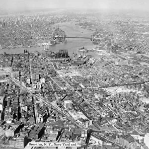 NEW YORK: NAVY YARD, c1930. Aerial view of Brooklyn, New York, including the United
