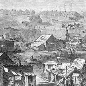 NYC: SQUATTERS, 1869. Squatters and their dilapidated shanties on hilly, broken land near New York Citys Central Park. Wood engraving, American, 1869