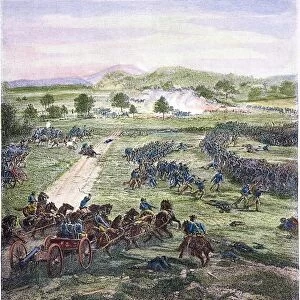 PICKETTs CHARGE, 1863. The Union army artillery (foreground) dominating the division of Confederate General George E. Pickett as they charge up Cemetery Ridge (far background) at the Battle of Gettysburg, Pennsylvania, 3 July 1863. Wood engraving