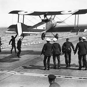 Squadron Commander Edwin Harris Dunning landing his Sopwith Pup biplane on the HMS Furious, the first plane ever to be landed on a moving ship, in Scapa Flow, Orkney, Scotland, 2 August 1917