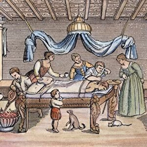 A surgeon trephining the skull of a patient at home. Line engraving after a 16th century woodcut