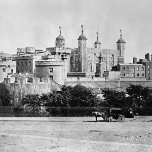 TOWER OF LONDON, 1890s. View of the Tower of London, dominated by the White Tower, dating to 1078