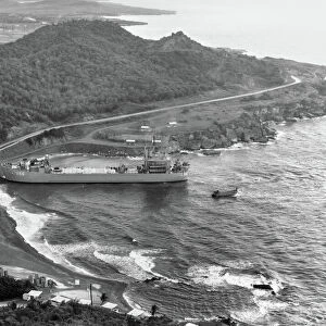 The USS Terrebonne Parish (LST-1156) tank landing ship docking at Windmill Beach, Guantanamo Bay, Cuba, during the Cuban Missile Crisis, 2 November 1962