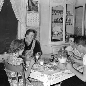 UTAH: DINNER, 1940. The family of Mrs. Marinus W