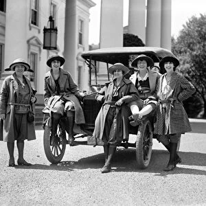 WOMEN WITH AUTOMOBILE. A group of women with an automobile outside the White House in Washington