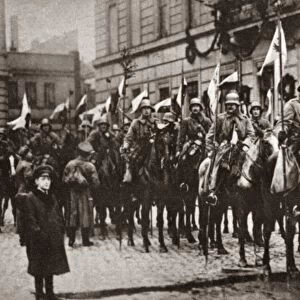 WORLD WAR I: BERLIN, C1918. Squadron of Prussian Cavalry with decorated flagstaffs