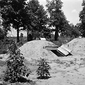WORLD WAR II: FOOD STORAGE. Food storage bunkers built by families who received