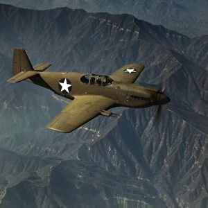 WWII: P-51 MUSTANG, 1942. A P-51 Mustang fighter plane in flight over Inglewood, California