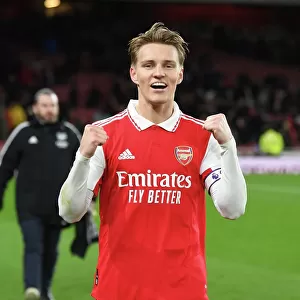 Arsenal Celebrate Victory: Martin Odegaard Leads the Way vs. Everton (2022-23)