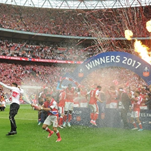 The Arsenal team celebrate with the traophy after the match. Arsenal 2: 1 Chelsea