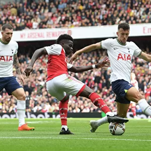 Arsenal vs. Tottenham: Bukayo Saka Faces Off Against Ivan Perisic in the 2022-23 Premier League Clash at Emirates Stadium