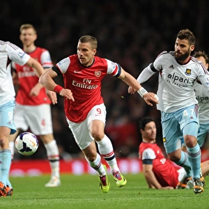 Arsenal vs. West Ham: Podolski Clashes with Nocerino and Carroll