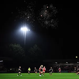 Arsenal vs. West Ham United: Women's Super League Clash Illuminated by Fireworks