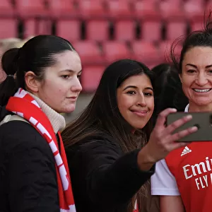 Arsenal Women Celebrate FA WSL Victory: Jodie Taylor Amidst Ecstatic Fans
