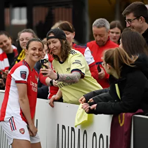 Arsenal Women Celebrate with Fans After Victory Over Aston Villa in FA WSL
