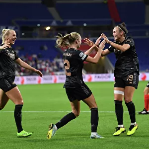 Arsenal Women's Double Strike: Celebrating Goals Against Olympique Lyonnais in UEFA Women's Champions League
